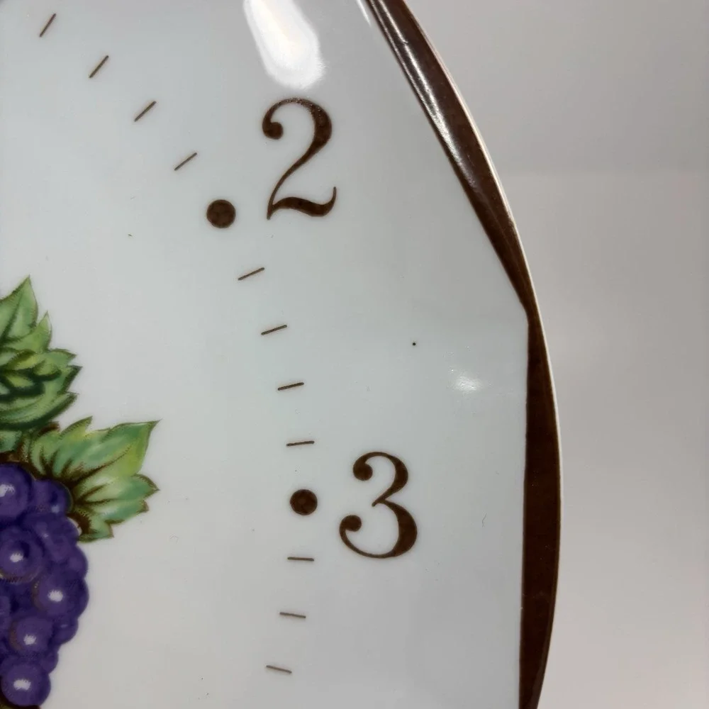 Vintage Linden brand Ceramic wall clock with a fruit motif Round 10.5